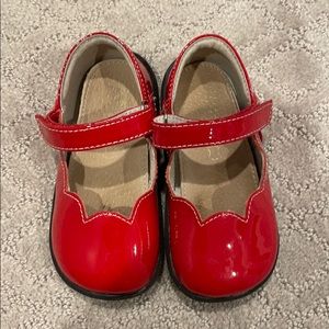 Gently used red shoes